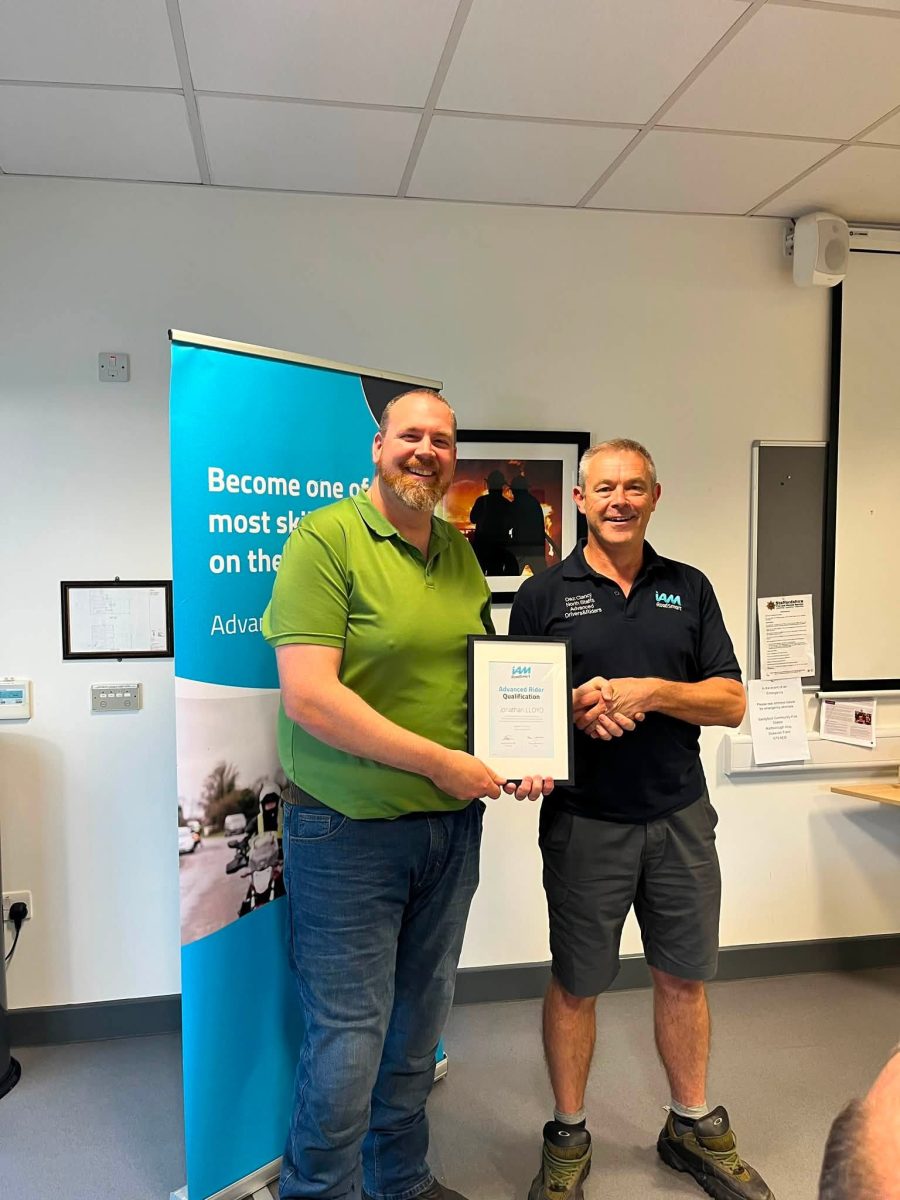 Jonathan Lloyd celebrating his IAM RoadSmart Advanced Rider Test pass with NSADR