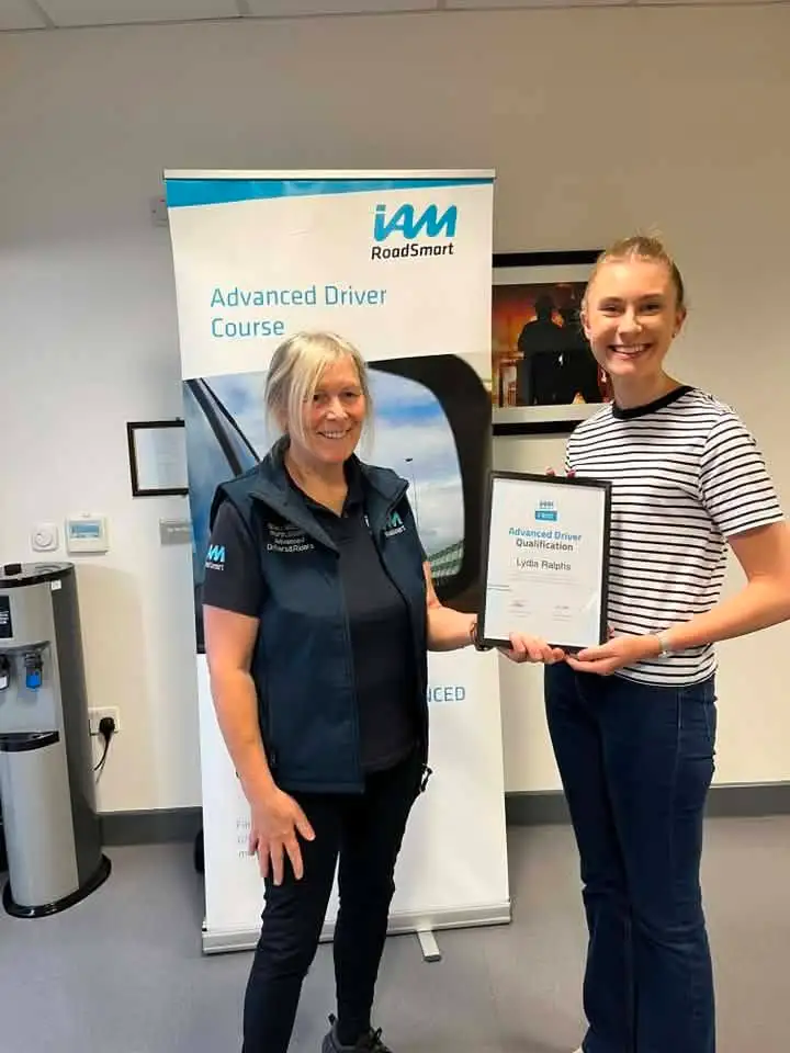 Lydia Ralphs celebrating her IAM RoadSmart Advanced Driver F1RST with National Observer Shaz Mitchell