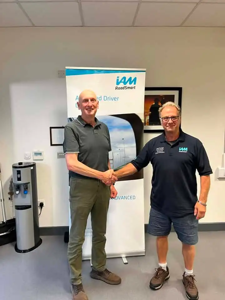 Jeff Davies celebrating his IAM RoadSmart Advanced Driver F1RST result with National Observer Neil Scarlett
